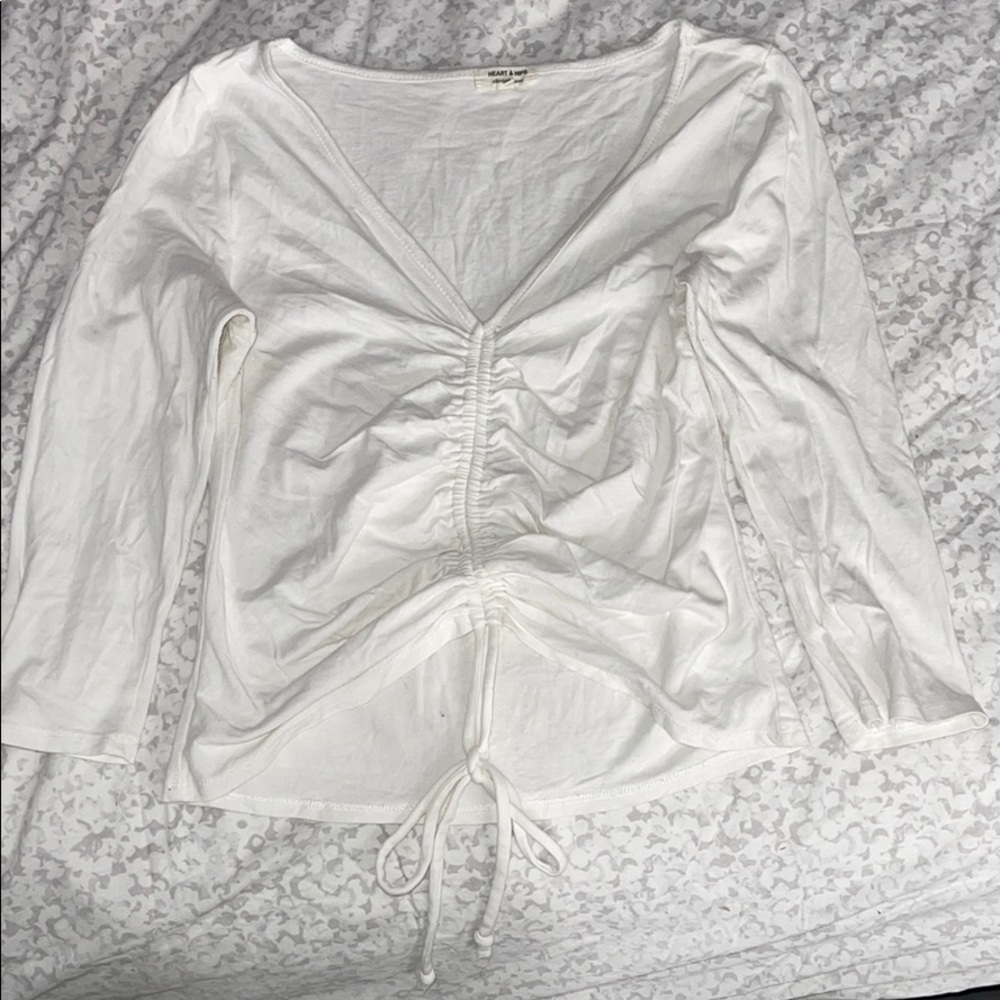 White mid sleeve top with adjustable tie in front